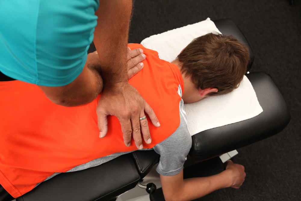 Chiropractor Shoulder Adjustment For Stiffness Pain Recovery